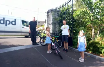 DPD delivering bikes to a family